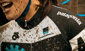 patagonia ad with mud on cyclist