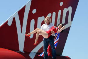 Richard Branson with Dita von Teese at a Virgin media event.