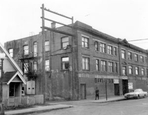 Photograph shows the back of the building and 208 - 214 Union Street, (Porters Club Building).